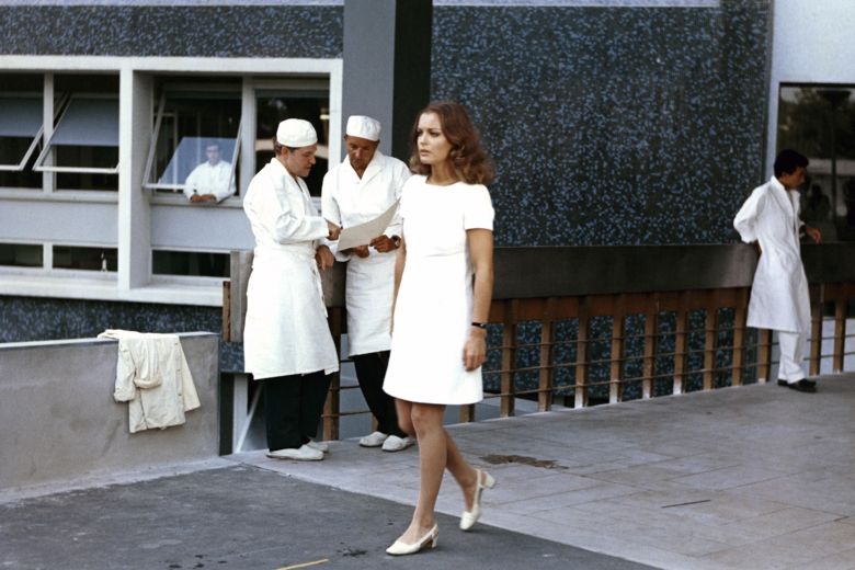 Romy Schneider Helene in film les choses de la vie 1970 walking out of the hospital after knowing Pierre´s death wearing André Courrèges white short sleeve dress walking out of hospital