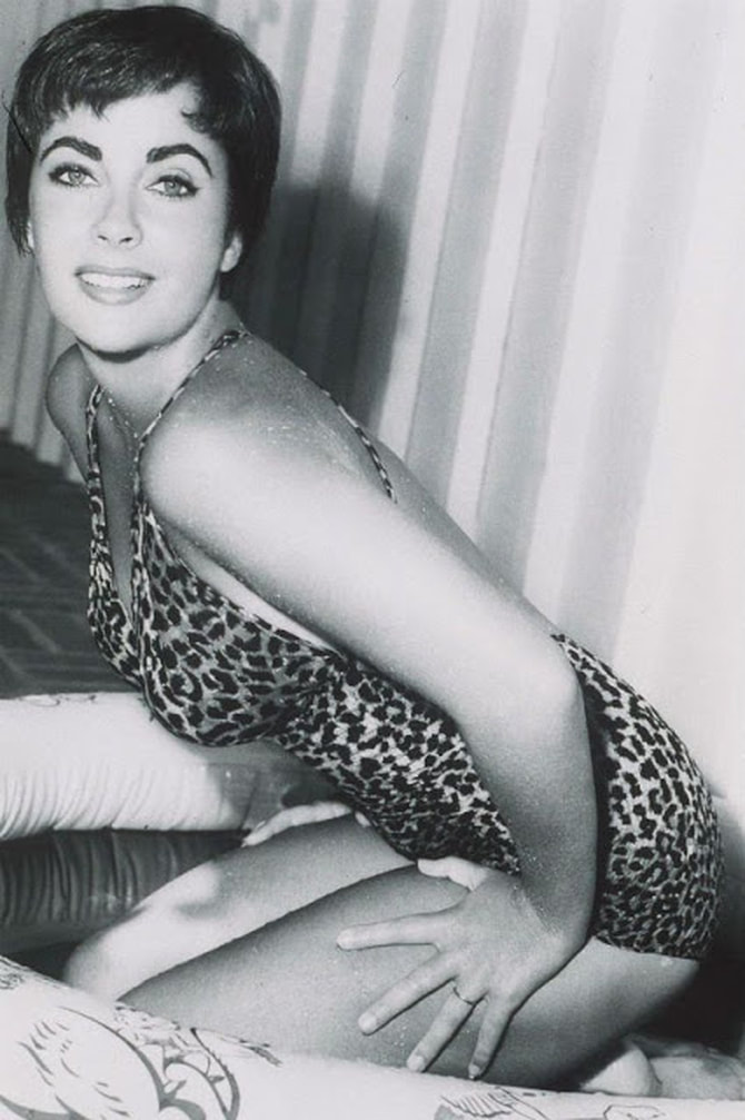 Elegant style icon wardrobe essentials: Elizabeth Taylor in swimwear, a one piece swimsuit in leopard print