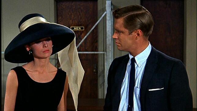 Audrey Hepburn movie costume in film Breakfast at Tiffany's(1961), the complete wardrobe of Holly Golightly:Black sleeveless knee length dress with tie belt and hem fringes
