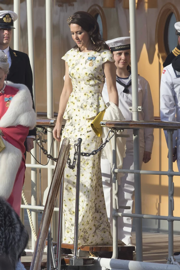 Celebrating Crown Princess Mary of Denmark's 50th birthday in 50 elegant day dresses and evening gowns: Princess Mary in yellow patterned evening gown