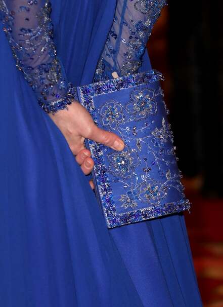 Kate Middleton in royal blue Jenny Packham gown with matching beaded clutch