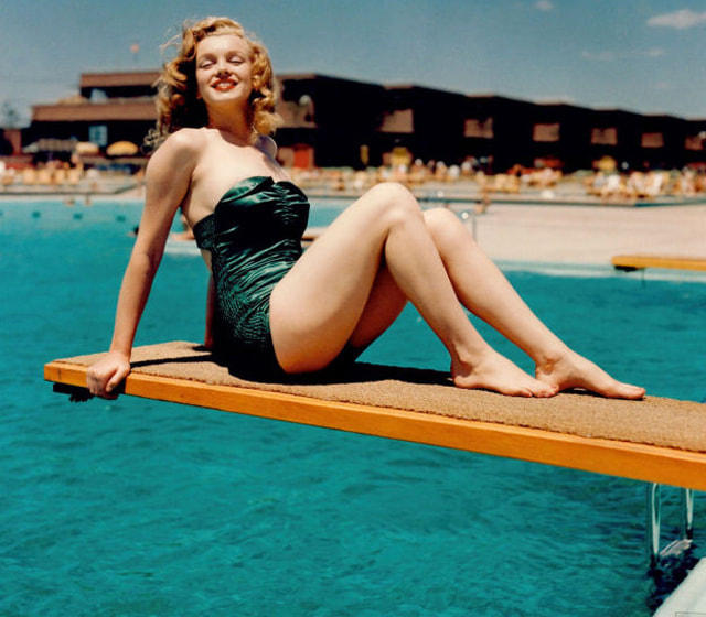 Elegant style icon wardrobe essentials: Marilyn Monroe in swimwear, a one piece strapless swimming bathing suit