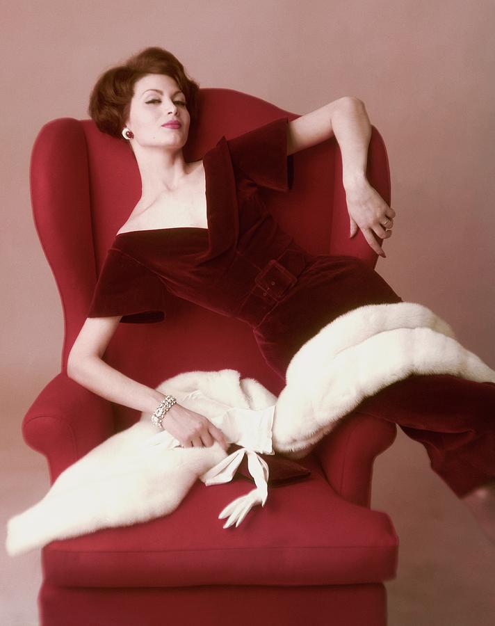 A model wearing a red velvet dress, photo by John Rawlings(1912-1979)