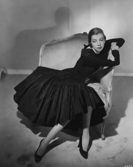 Pauline Potter modeling a short evening dress of black taffeta for Vogue, 1950, Photo by Horst P. Horst