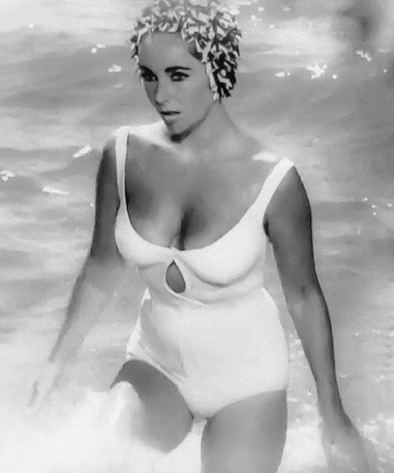 Elegant style icon wardrobe essentials: Elizabeth Taylor in swimwear, a white one piece swimsuit, in film Suddenly Last Summer(1959)