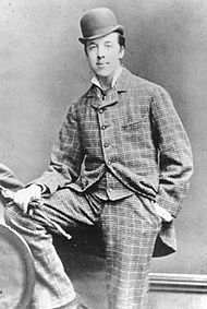the most elegant Irish man Oscar Wilde in checked suit and a bowler hat, Oxford, 1876