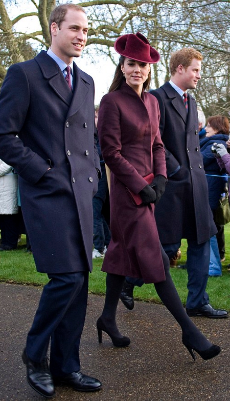 Kate Middleton wore an aubergine wool coat with funnel neck tailored by an independent dressmaker on Christmas Day 2011