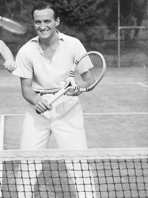 David Niven plays tennis
