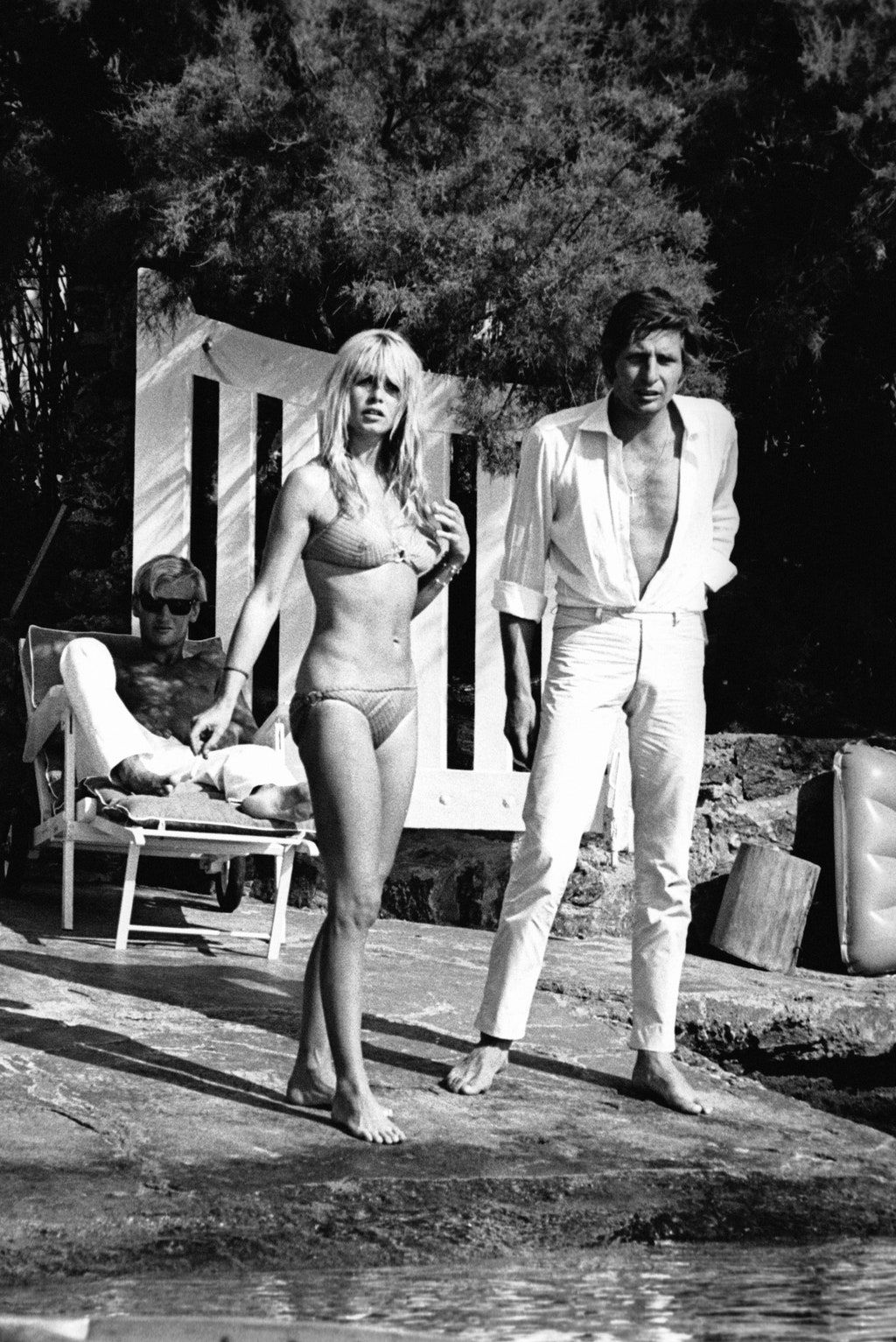 Elegant style icon wardrobe essentials: Brigitte Bardot in swimwear, a two piece bikini in polka dot print