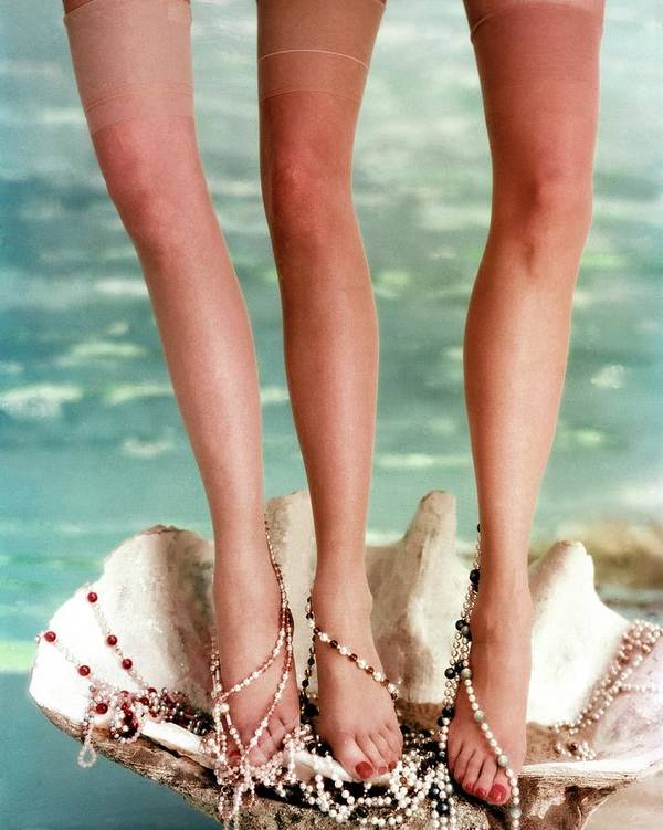 Three Legs from Three Models Standing On A Shell, photo by John Rawlings(1912-1979)
