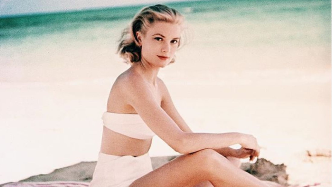 Elegant style icon wardrobe essentials: Grace Kelly in swimwear, a white strapless bikini