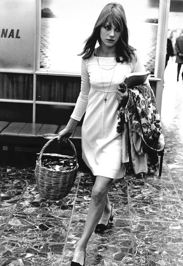 Jane Birkin carrying her omnipresent wicker basket