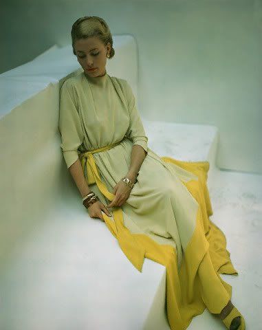 A model in a lime green dress with yellow trim and belt, photo by John Rawlings(1912-1979)