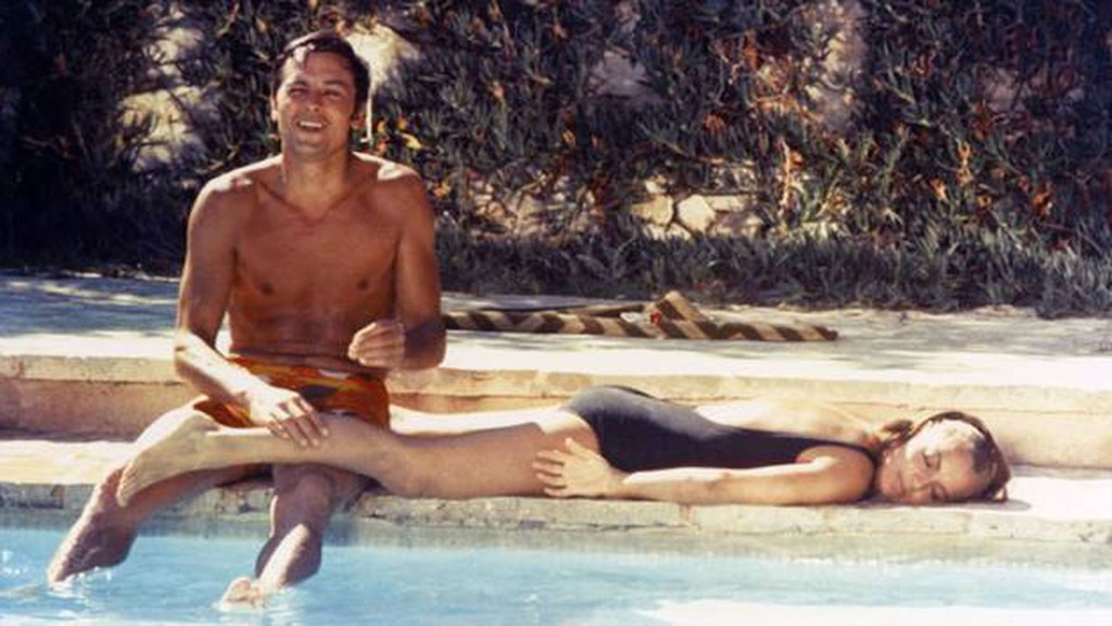 Alain Delon with Romy Schneider in film La piscine(The Swimming Pool), 1968