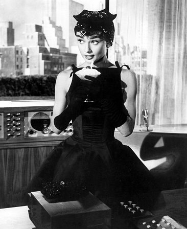 Audrey Hepburn in little black dress in film Sabrina designed by Hubert de Givenchy