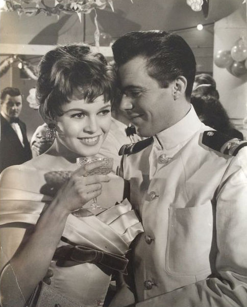 Dirk Bogarde with Brigitte Bardot in film Doctor at Sea (1955)