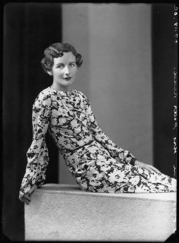 the women dressed by Christian Dior Nancy Mitford in floral long sleeve dress