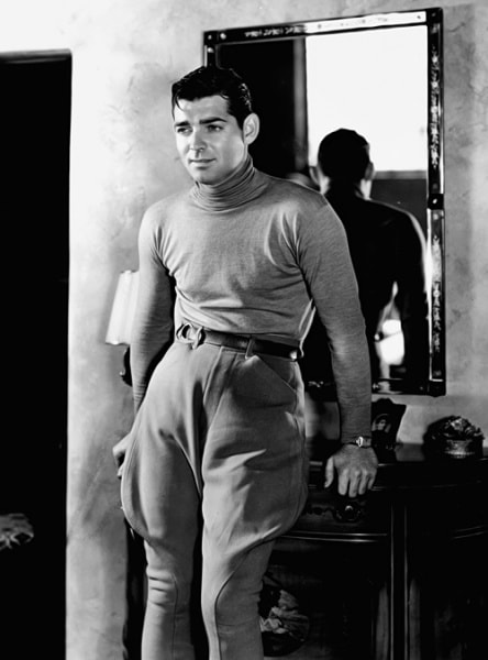 Clark Gable in turtleneck sweater with riding pants