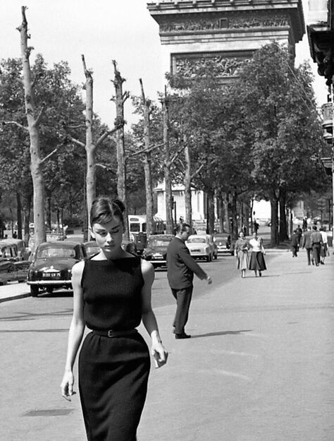 Elegant style icon wardrobe essentials: Audrey Hepburn in little black dress, Paris, France