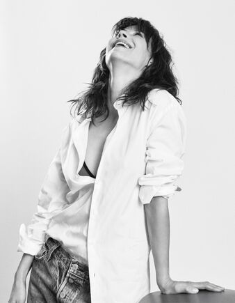 Elegant style icon wardrobe essentials: Sophie Marceau in white shirt