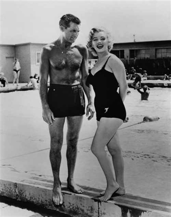 Elegant style icon wardrobe essentials: Marilyn Monroe in swimwear, a one piece swimming suit bathing suit