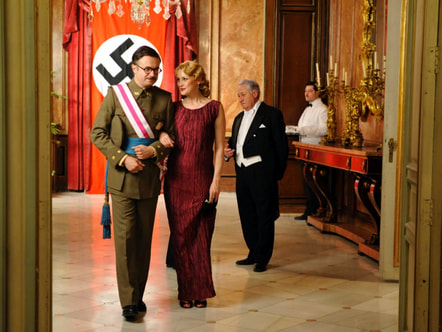 The false delphos dress created by Sira in Spanish tv series El Tiempo entre Costuras Mariano Fortuny's delphos dress