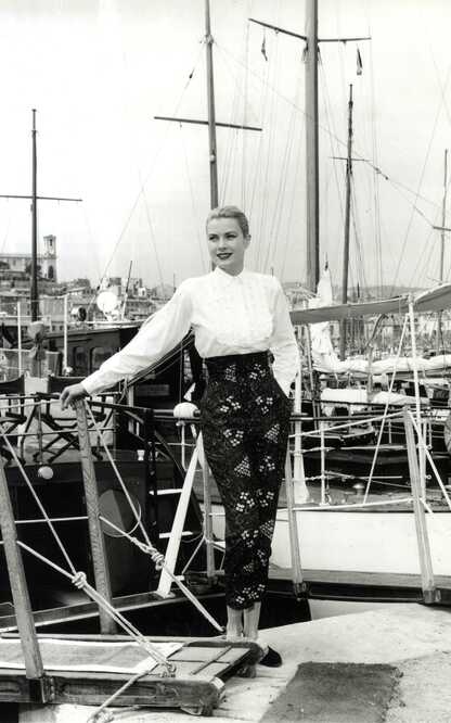 Grace Kelly in white shirt, Cannes film festival, 1955, photo by Edward Quinn