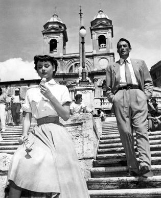 All about Audrey Hepburn movie costume ensemble of white shirt and ankle circle skirt in film Roman Holiday, 1953