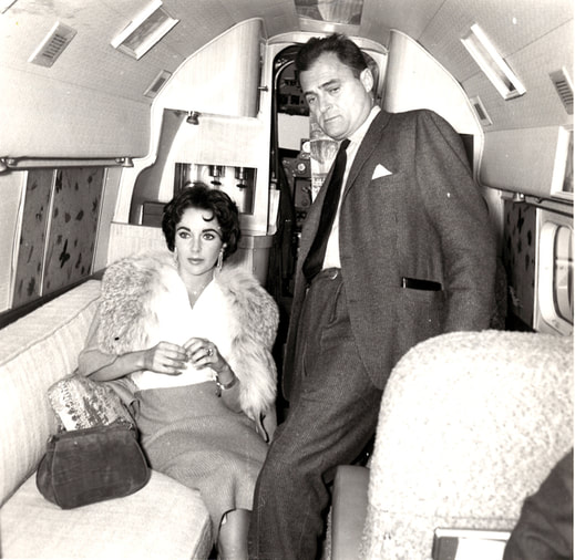 Elizabeth Taylor and Mike Todd on the airplane in which he would die in a crash