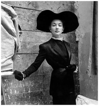 Model in suit by Balmain and hat by Legroux, photo by Clifford Coffin at the studio of Louis Leygue, Paris, British Vogue, April 1947, Photo by Clifford Coffin