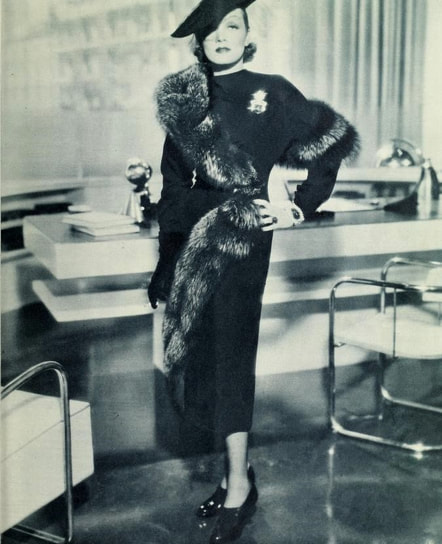 Marlene Dietrich in ensemble designed by Travis Banton, 1936