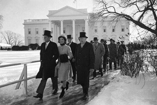 Jackie Kennedy wearing coat of knee length with three quarter length sleeves with her husband the President John F. Kennedy on the Inauguration day, 20 January 1961