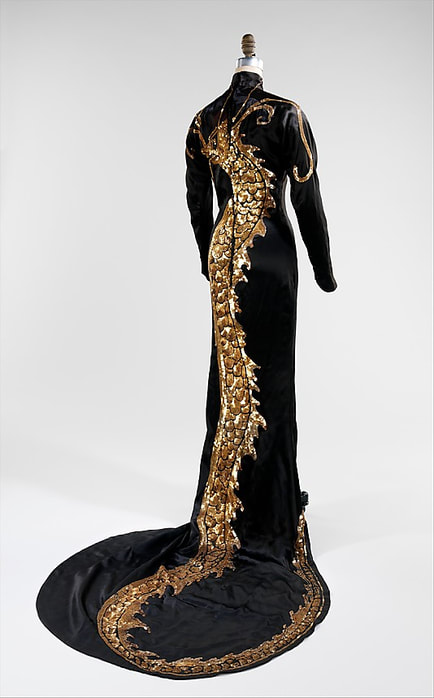Anna May Wong's black satin sequined gown with dragon motif in film Limehouse Blues, designed by Travis Banton, 1934