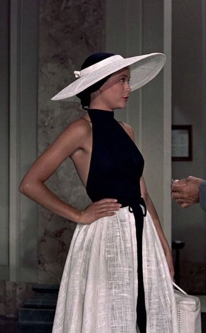 Elegant style icon wardrobe essentials: Grace Kelly in swimwear, a halter neck one piece swimming suit, in film To Catch a Thief(1956)