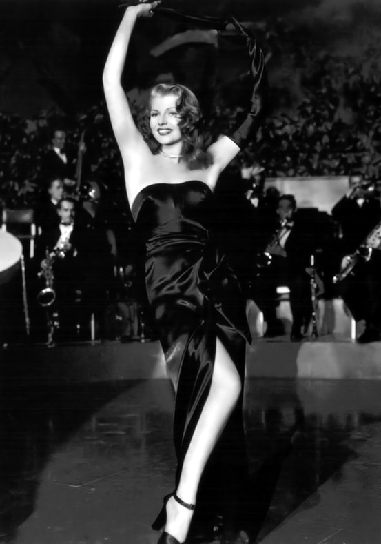 Rita Hayworth in film Gilda (1946), wearing strapless satin dress by Jean Louis