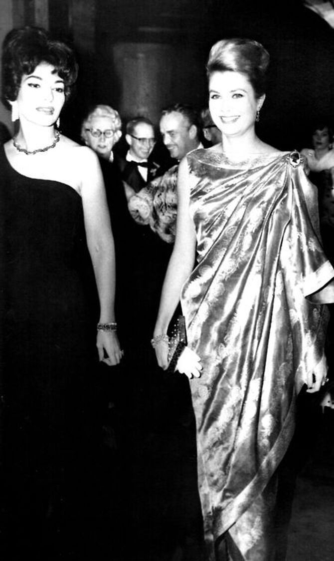Elegant style icon wardrobe essentials: Maria Callas in black dress, with Grace Kelly, Princess of Monaco, 1962
