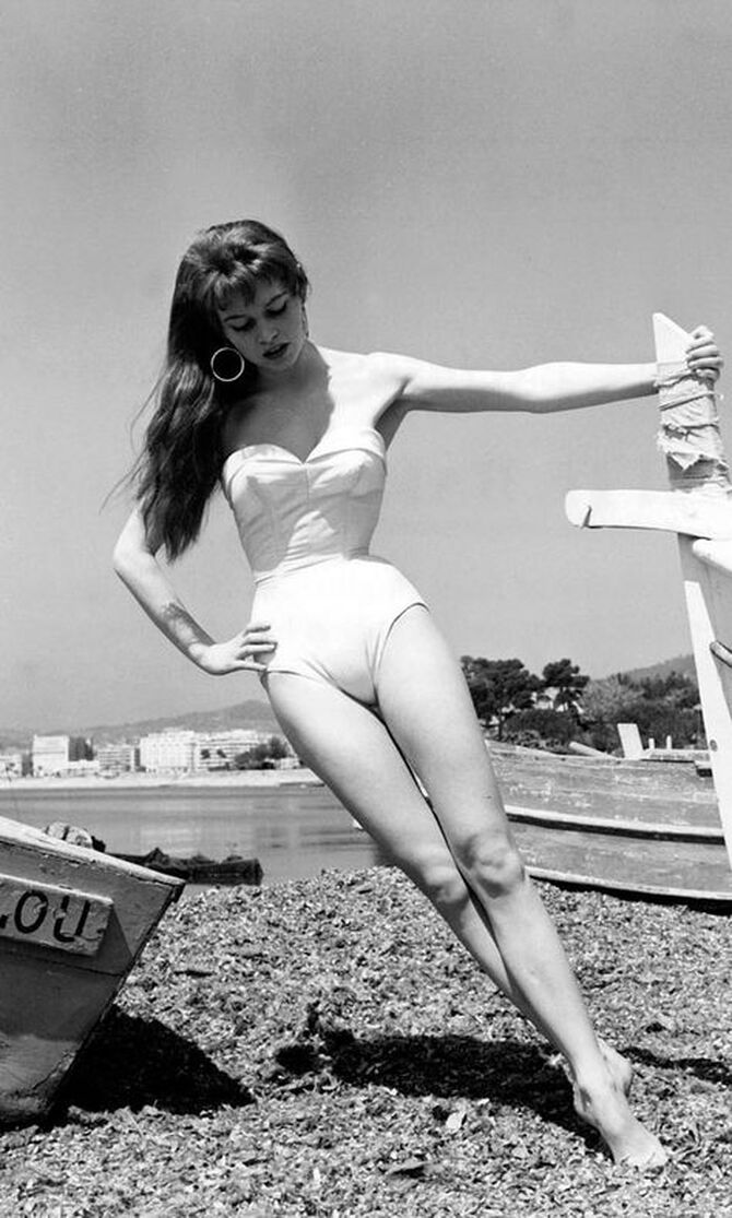 Elegant style icon wardrobe essentials: Brigitte Bardot in swimwear, a one piece strapless swimsuit