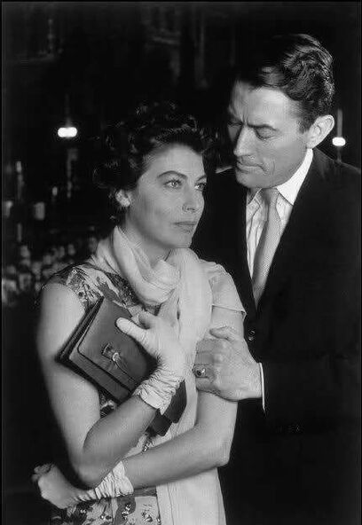 Gregory Peck with Ava Gardner, his co-star for three films and friend, filming On the Beach(1959)