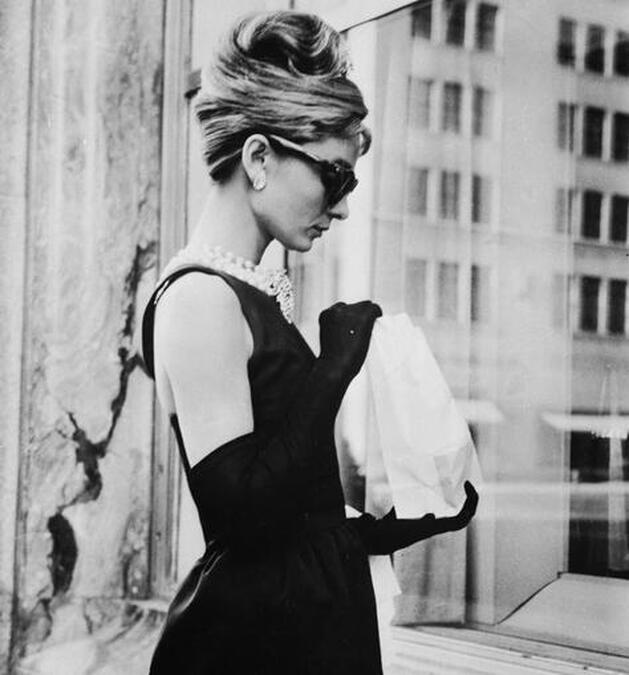 Audrey Hepburn movie costume in film Breakfast at Tiffany's(1961), the complete wardrobe of Holly Golightly:Black floor length sleeveless dress with moonlike back cut-out