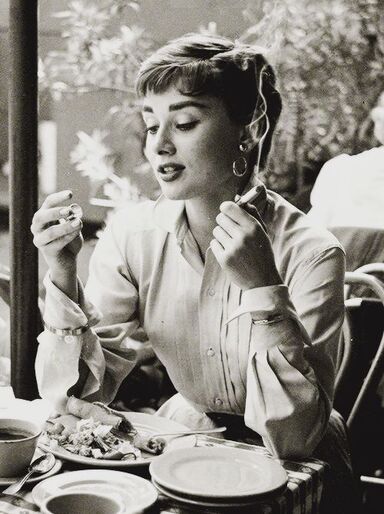 Audrey Hepburn in white shirt