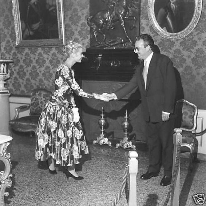 Grace Kelly square neck floral dress by McCall on her first meeting with Prince Rainier III in Monaco in 1955