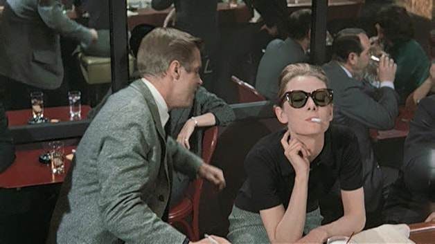 Audrey Hepburn movie costume in film Breakfast at Tiffany's(1961), the complete wardrobe of Holly Golightly: Black short-sleeved polo sweater with grey straight midi skirt