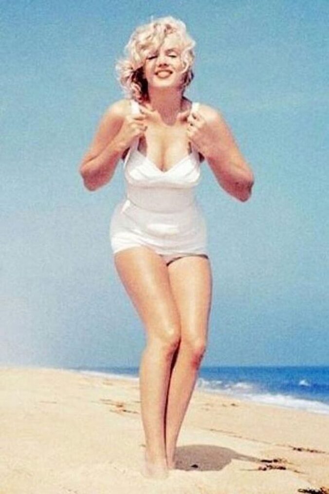 Elegant style icon wardrobe essentials: Marilyn Monroe in swimwear, a one piece white bathing swimming suit