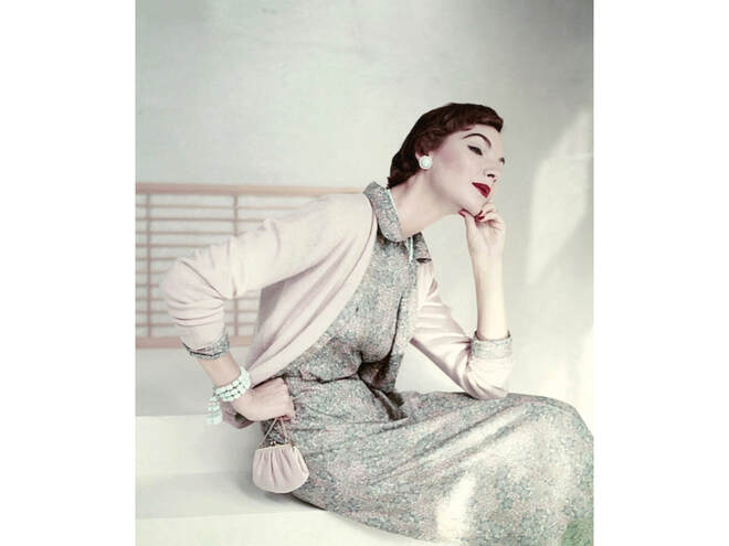 Model Cherry Nelms wearing Liberty silk dress under a cashmere cardigan,Vogue Jan 1954 © Frances McLaughlin-Gill