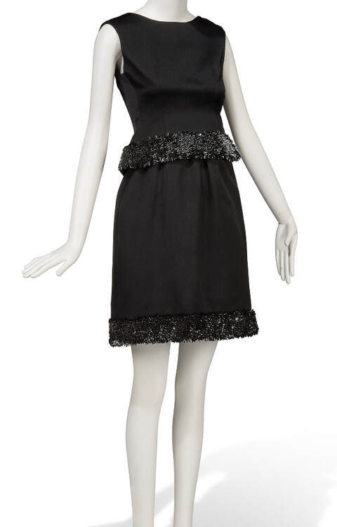 Elegant style icon wardrobe essentials: Audrey Hepburn in little black dress designed by Hubert de Givenchy, in film Charade(1963)