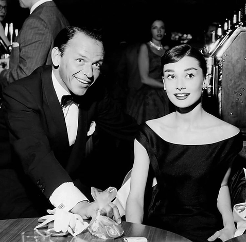 Elegant style icon wardrobe essentials: Audrey Hepburn in little black dress, Las Vegas, 1956