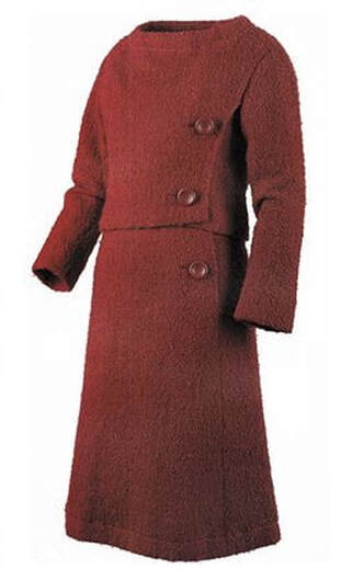 Jackie Kennedy’s red 2 piece day dress she wore for the CBS televised program: A Tour of the The White House with Mrs. Kennedy, 15 February 1962, designed by Chez Ninon featuring bateau neckline and long sleeves