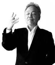 photo of Shinji Tanimura 谷村新司 in black and white