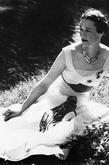 Wallis Simpson, Duchess of Windsor style: Wallis in white sleeveless dress with lobster motif designed by Elsa Schiapareli circa 1930