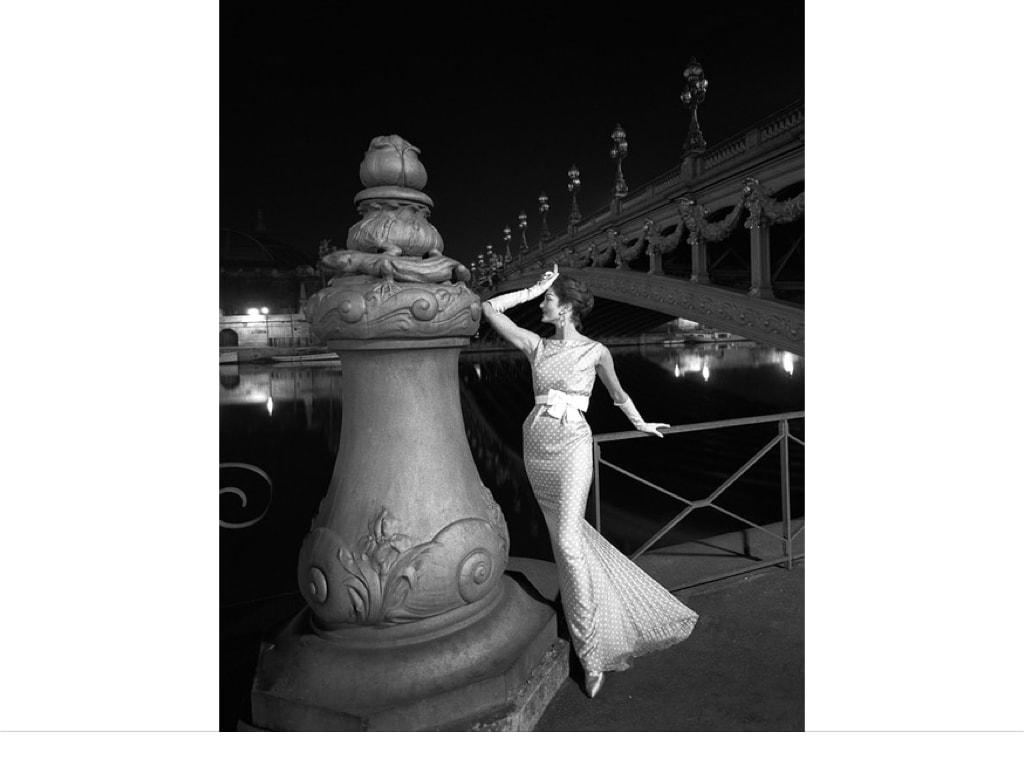 Elegant style icon wardrobe essentials: The Polka dot, model in Balmain silk polka dot dress at Seine, Paris, photo by Gleb Derujinsky
